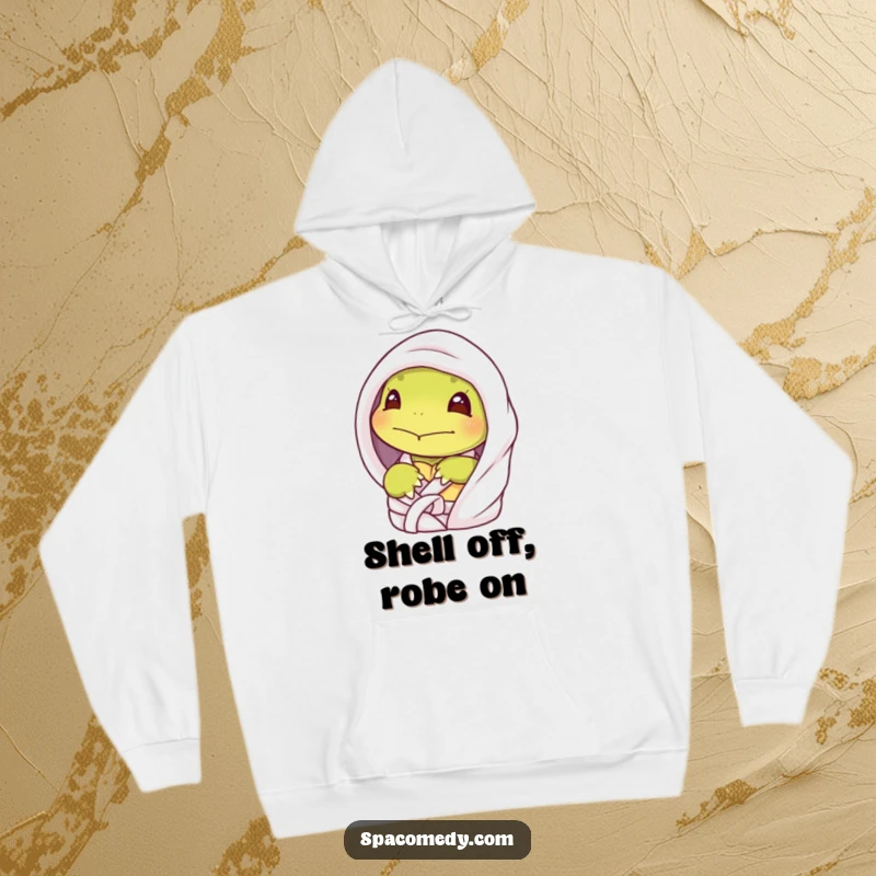 Funny shy turtle hoodie featuring a character peeking from a spa robe, offering cozy comfort and humorous introversion.